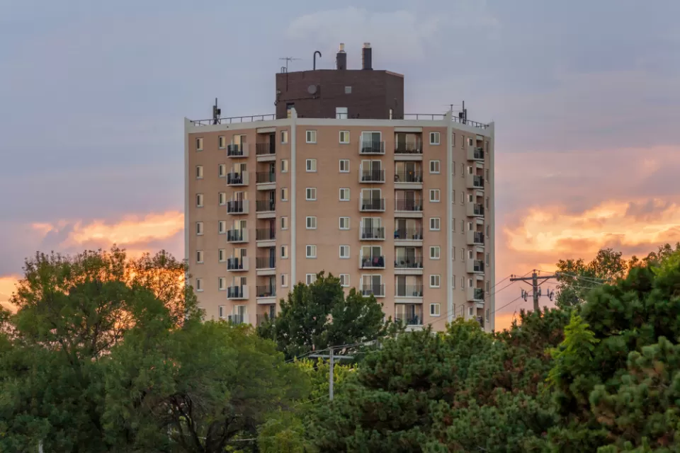 View of high-rise apartment building in St. Paul, Minnesota at sunset